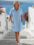 Emma & Rose Cape Town Briseis™ collared short sleeve dress, navy blue with button details, displayed on a mannequin.