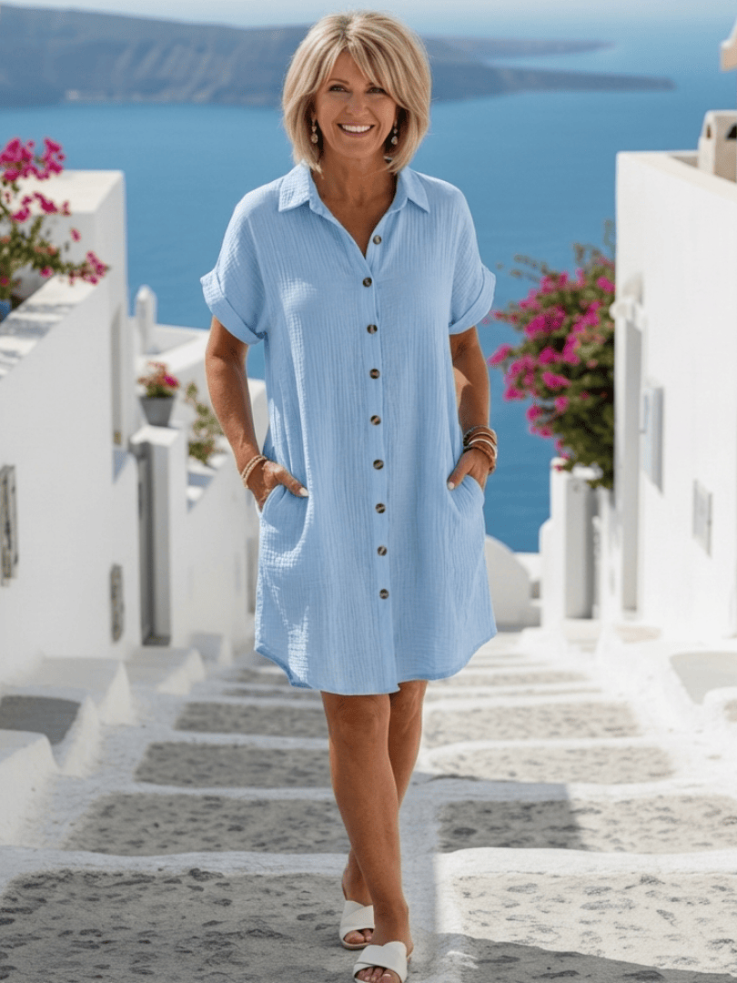 Emma & Rose Cape Town Briseis™ collared short sleeve dress, navy blue with button details, displayed on a mannequin.