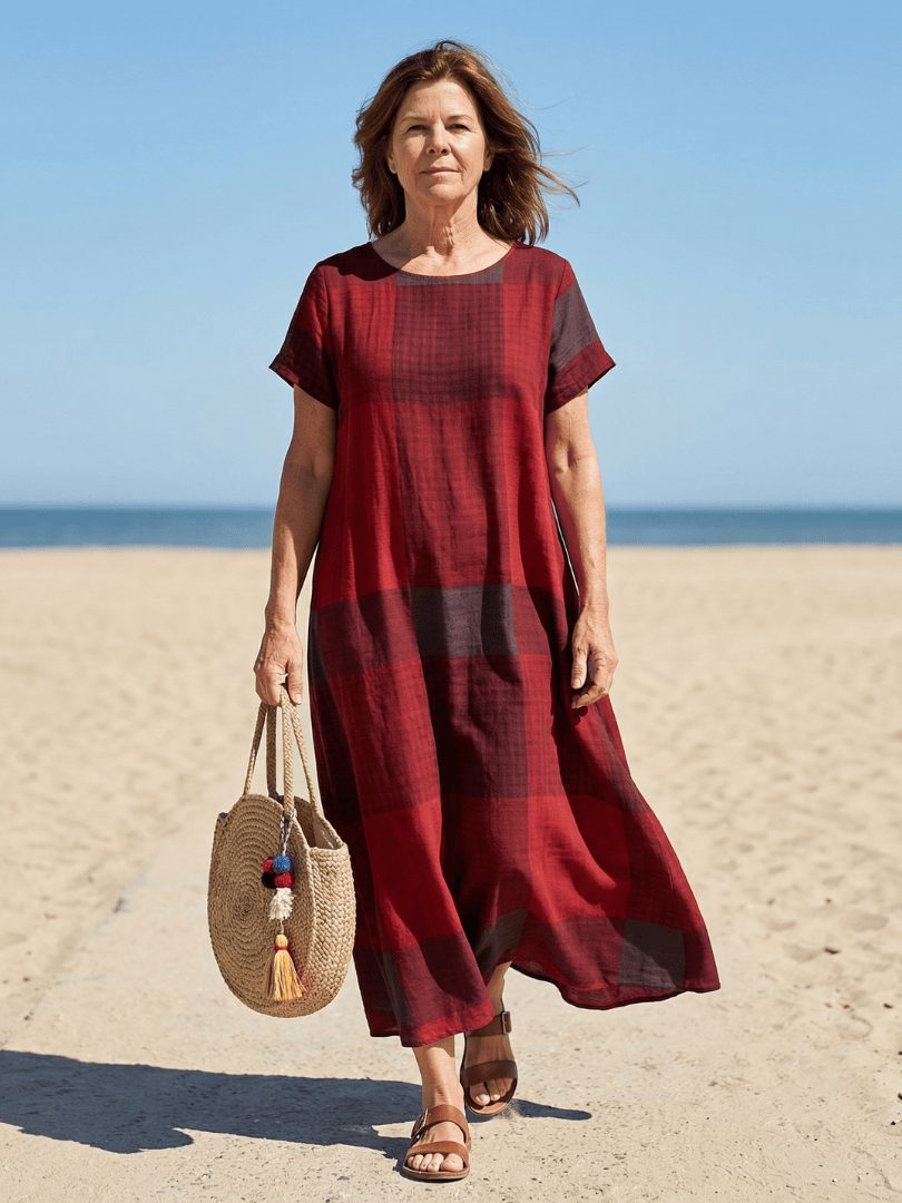 Alaia™ Relaxed Line Midi Dress by Emma & Rose Cape Town, featuring flowy fabric and a relaxed fit, shown on a model.