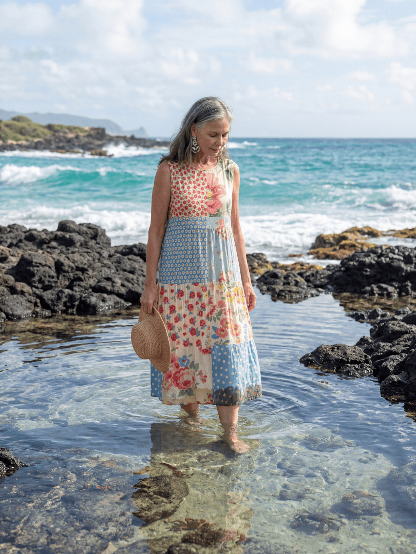 Kira™ Coastal Floral Midi Dress by Emma & Rose Cape Town featuring a flowy silhouette and vibrant floral pattern.