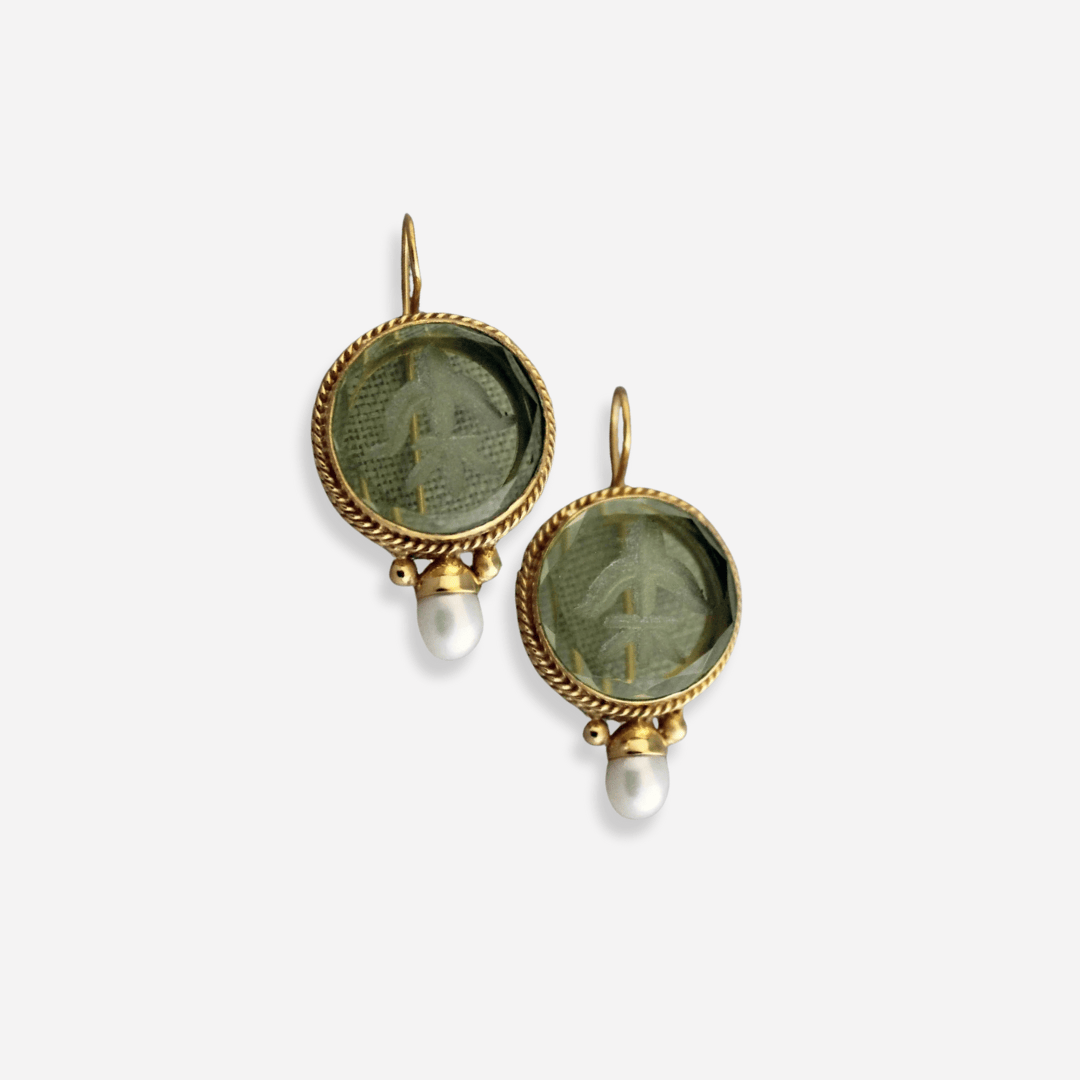 Elegant Navier™ earrings by Emma & Rose Cape Town featuring intricate silver design with gemstone accents.