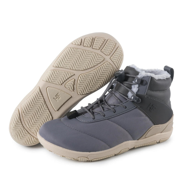 Emma & Rose Cape Town Azura™ winter barefoot shoes in black, showing the flexible sole and sleek design for cold weather wear.