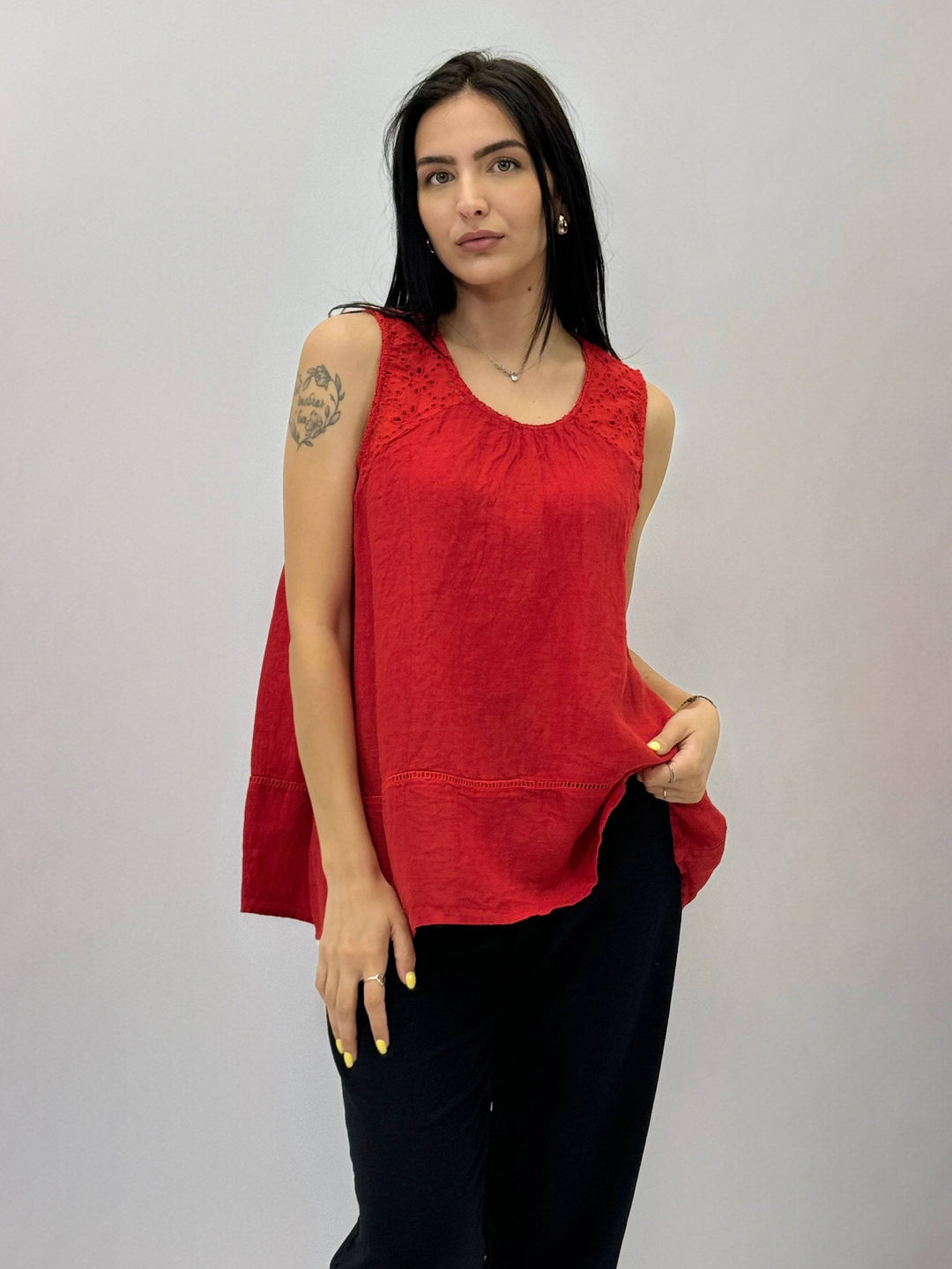 Emma & Rose Cape Town Ethan™ tank top in soft knit maglieria, close-up of fabric and detailing on light-colored tank top.