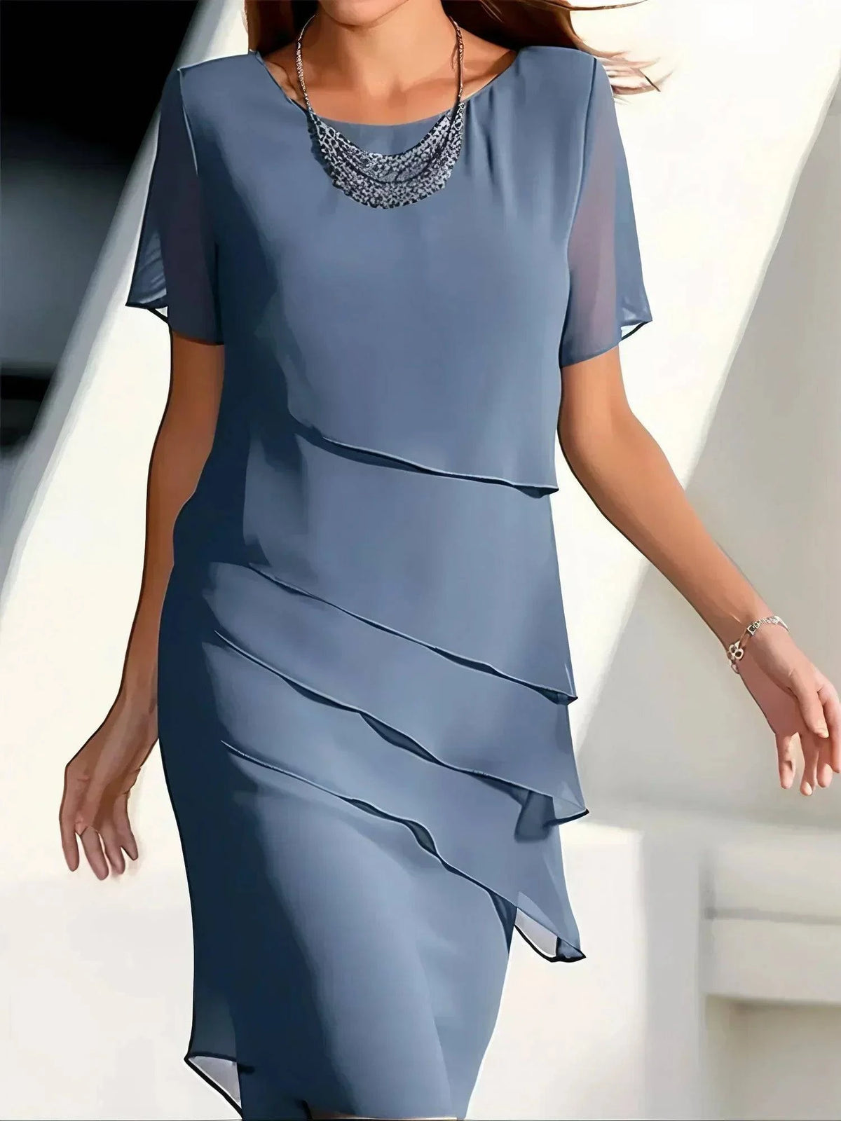 Blue Janet™ elegant dress by Emma & Rose Manhattan, featuring a stylish fit and flowing fabric, perfect for formal occasions.