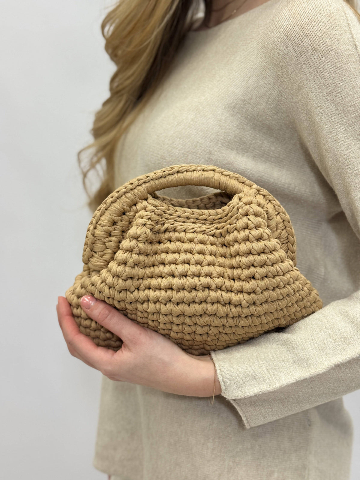 Lieke™ crochet bag by Emma & Rose Cape Town, artisan Italy, featuring intricate crochet design and natural woven texture.