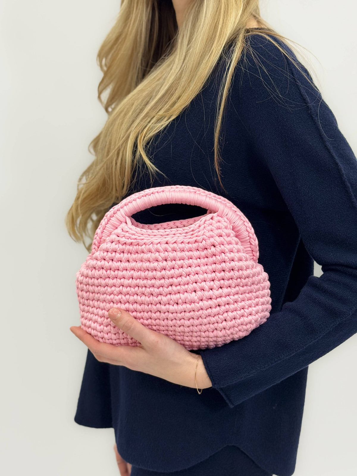 Lieke™ crochet bag by Emma & Rose Cape Town, artisan Italian craft, with intricate woven design and natural fiber texture.