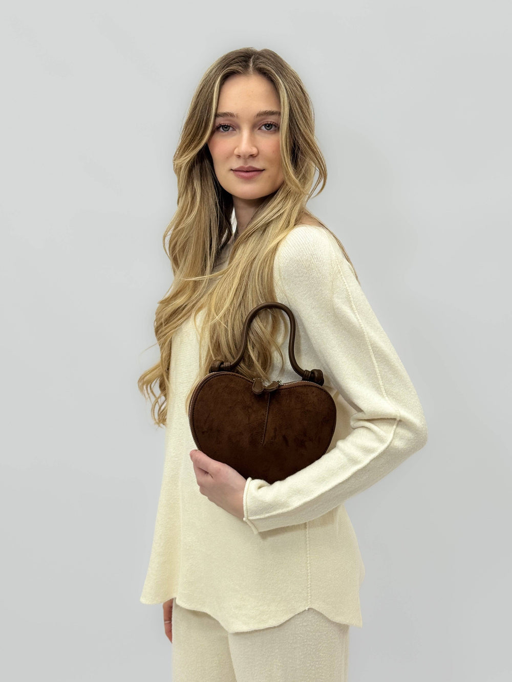 Greta™ heart-shaped Emma & Rose Cape Town soft fabric handbag with chic luxurious effect, stylish and elegant accessory.