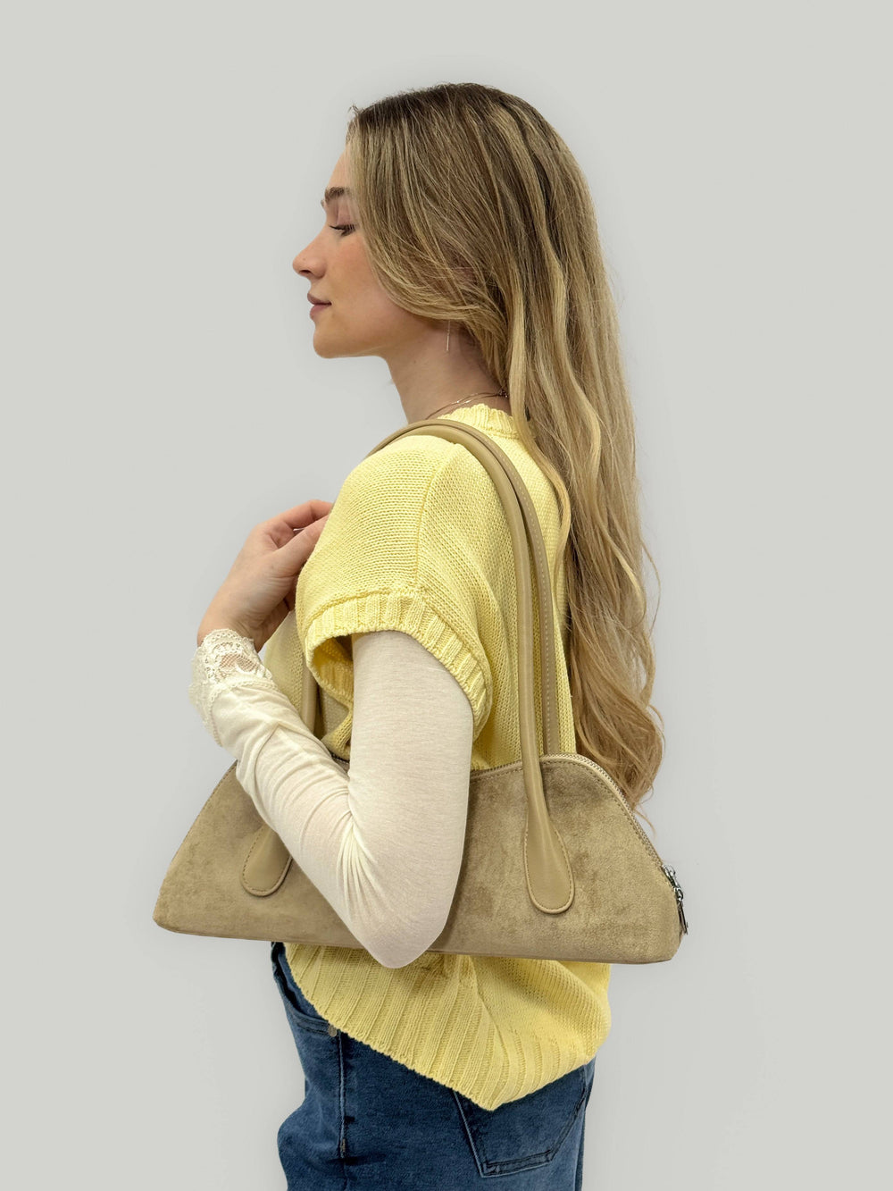 Emma & Rose Cape Town Imke™ women's borse made from soft, luxurious fabrics, showcased in a stylish model image.