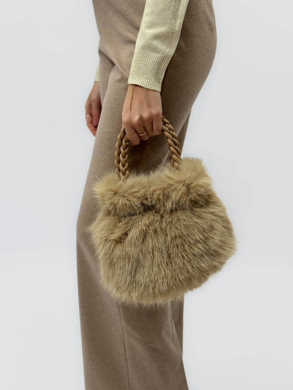 Emma & Rose Cape Town Willemien™ soft faux fur handle bag with a stylish design, featuring a luxurious furry handle.