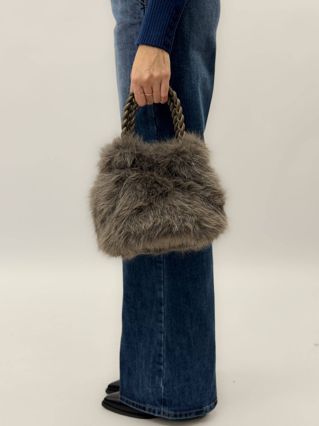 Emma & Rose Cape Town Willemien™ soft faux fur handle bag with plush, textured fur detail on the strap.