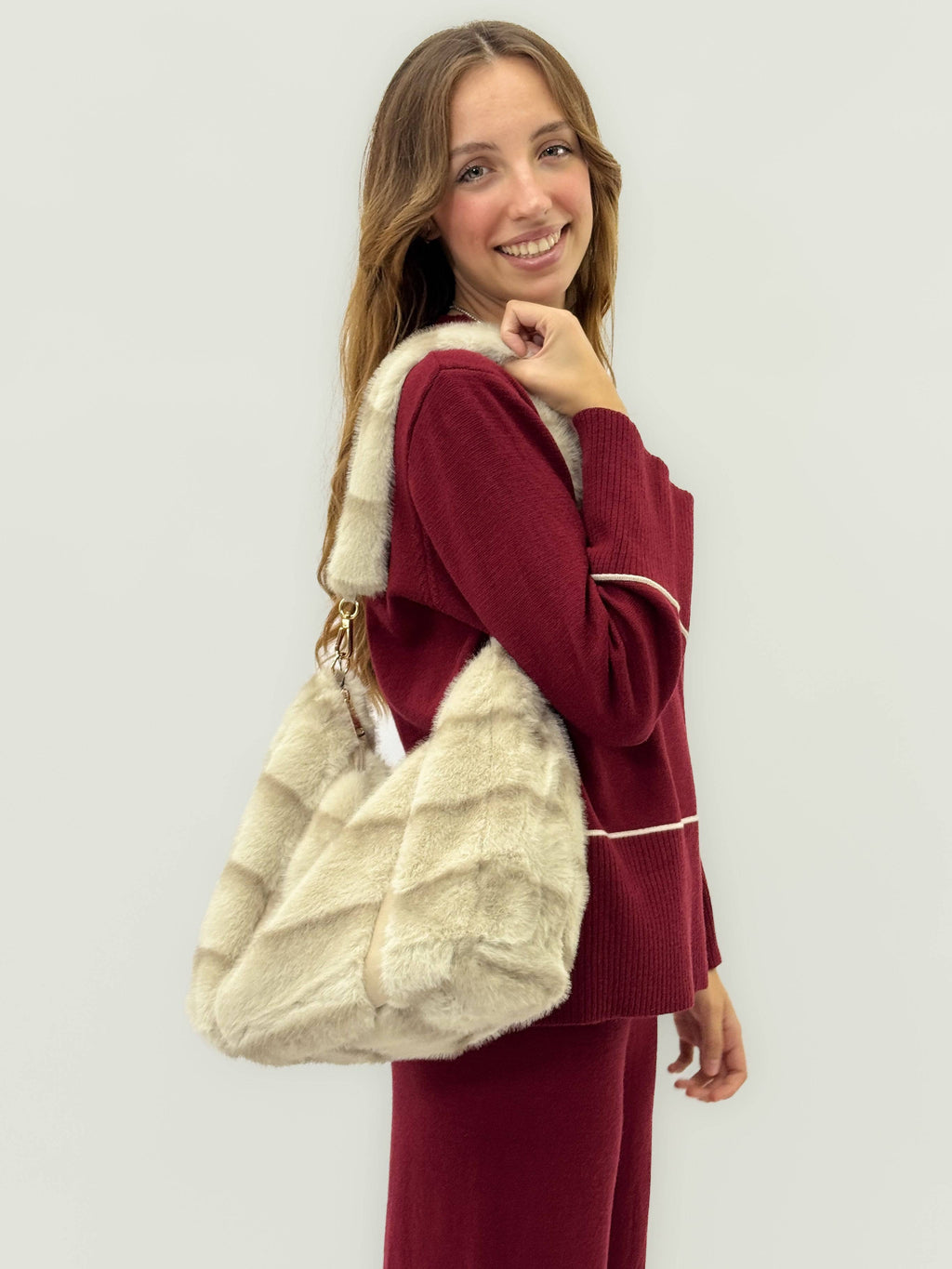 Olivia™ shoulder bag by Emma & Rose Cape Town with eco-friendly strap, featuring stylish design and practical size.
