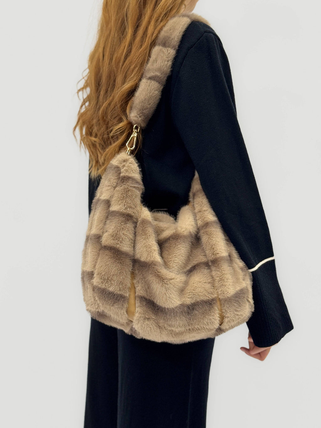 Olivia™ shoulder bag by Emma & Rose Cape Town with eco-friendly strap, stylish black borse with sleek design and adjustable strap.