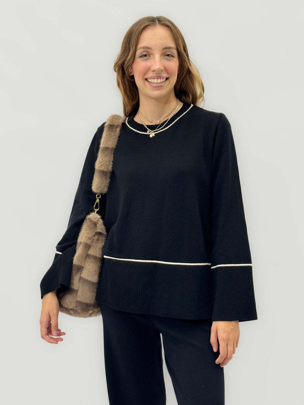 Olivia™ shoulder bag by Emma & Rose Cape Town with eco-friendly strap, stylish leather-like material, and spacious interior.