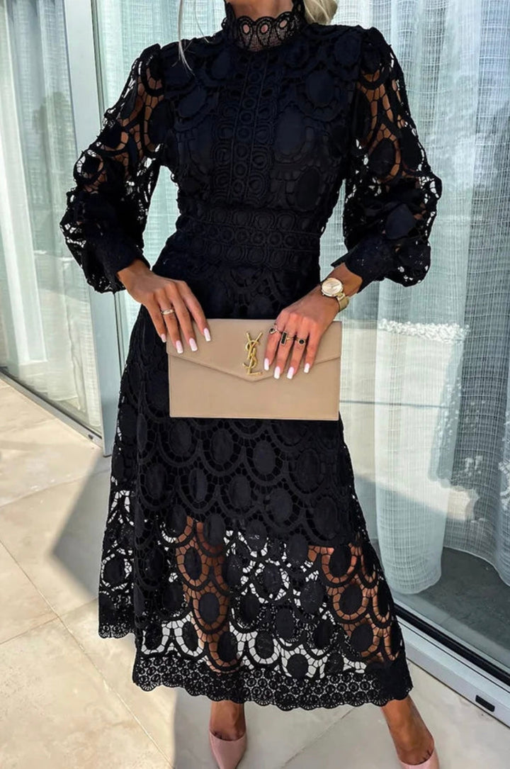 Elegant lace dress with high collar and transparent details