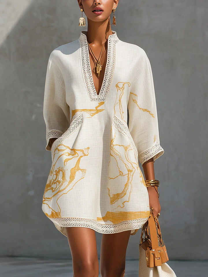 Donatella - Mini black dress with golden marble print and crochet lace