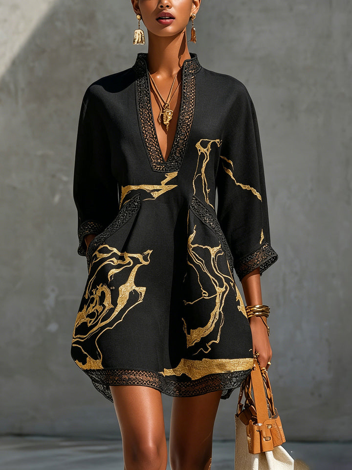 Renata - Short lace dress with gold print and deep V-neck