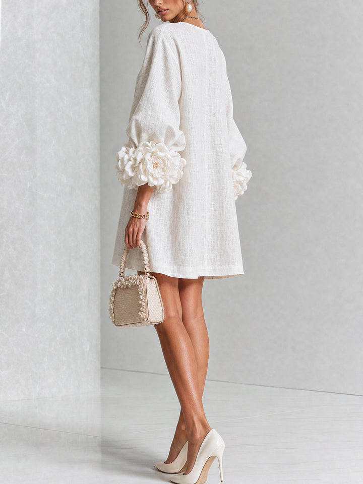 White Mini Dress with Floral Buttons and Dramatic Floral Sleeves