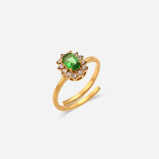 Emma & Rose Cape Town Amaryelle™ green zirconia ring with gold band, showcasing an elegant adjustable ring design.