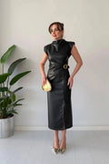 Elegant flowing Numira™ dress by Emma & Rose Manhattan, showcasing soft fabric and stylish design.