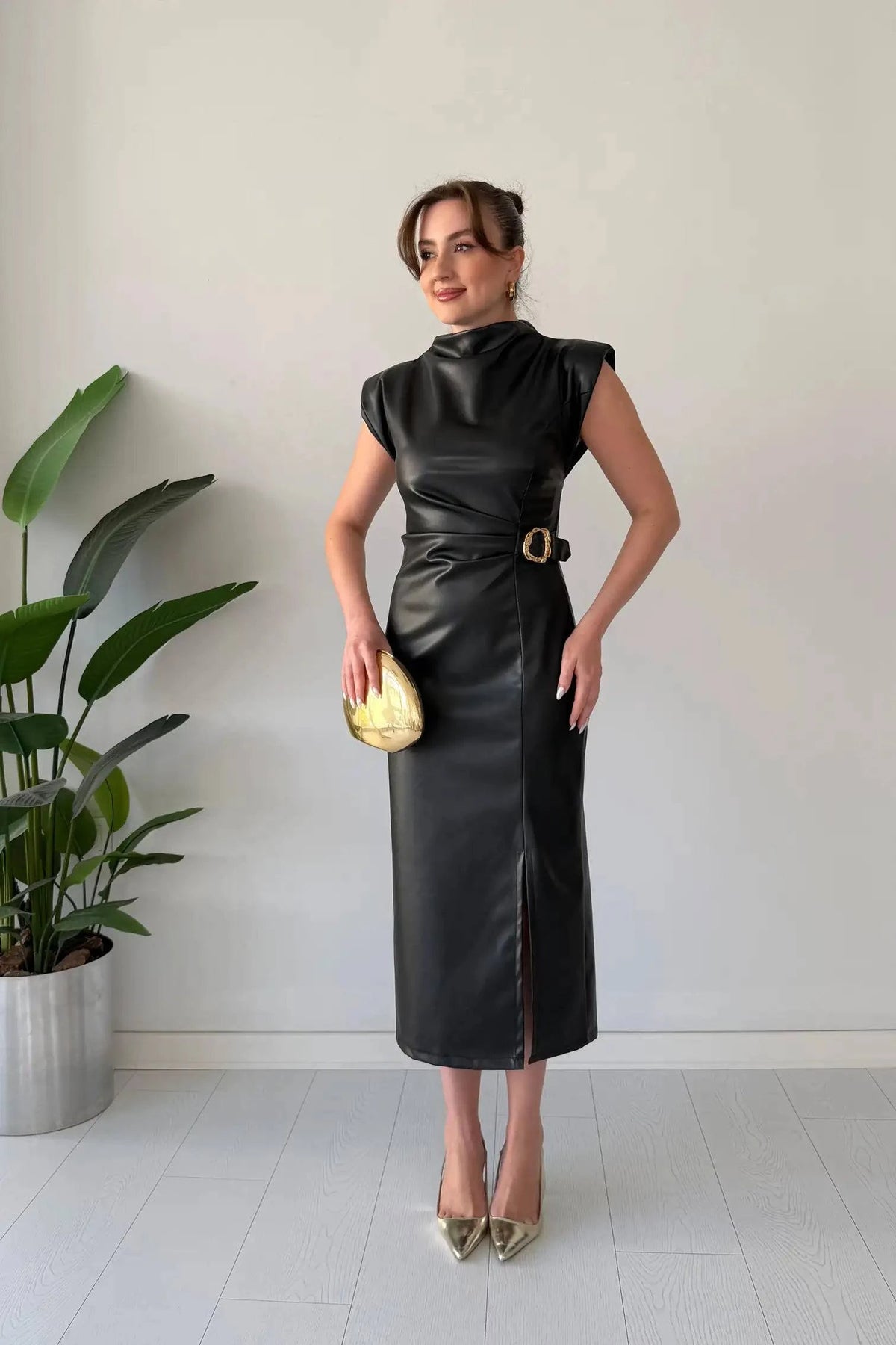 Elegant flowing Numira™ dress by Emma & Rose Manhattan, showcasing soft fabric and stylish design.