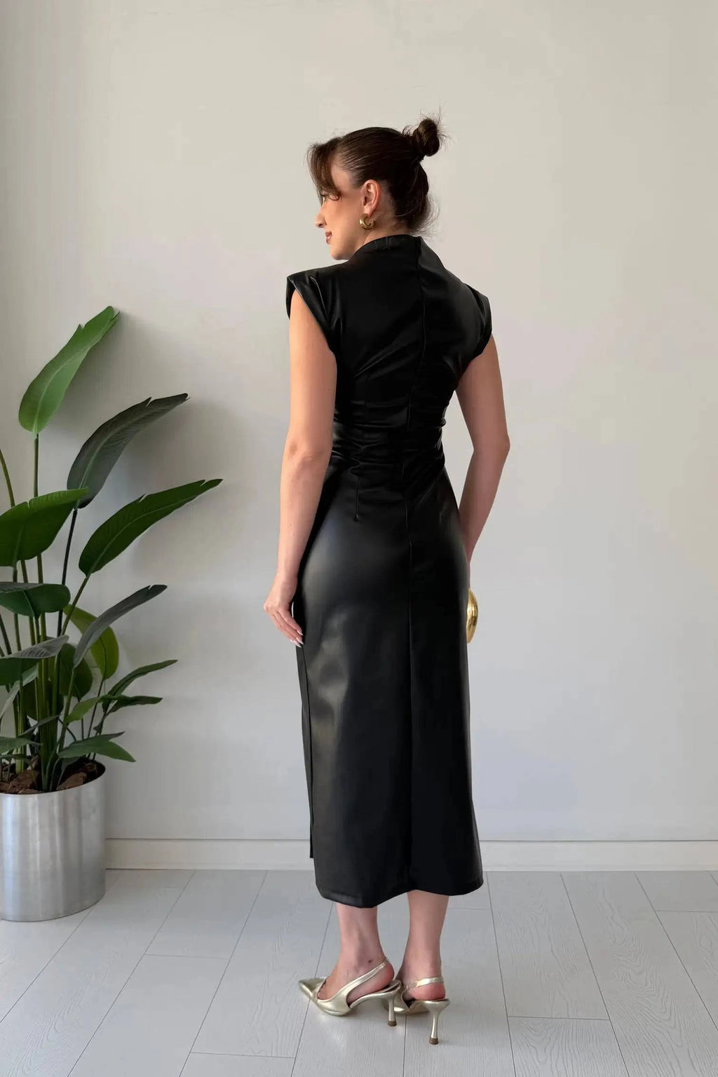 Elegant flowing Numira™ dress by Emma & Rose Manhattan, featuring a lightweight, stylish design with intricate details.