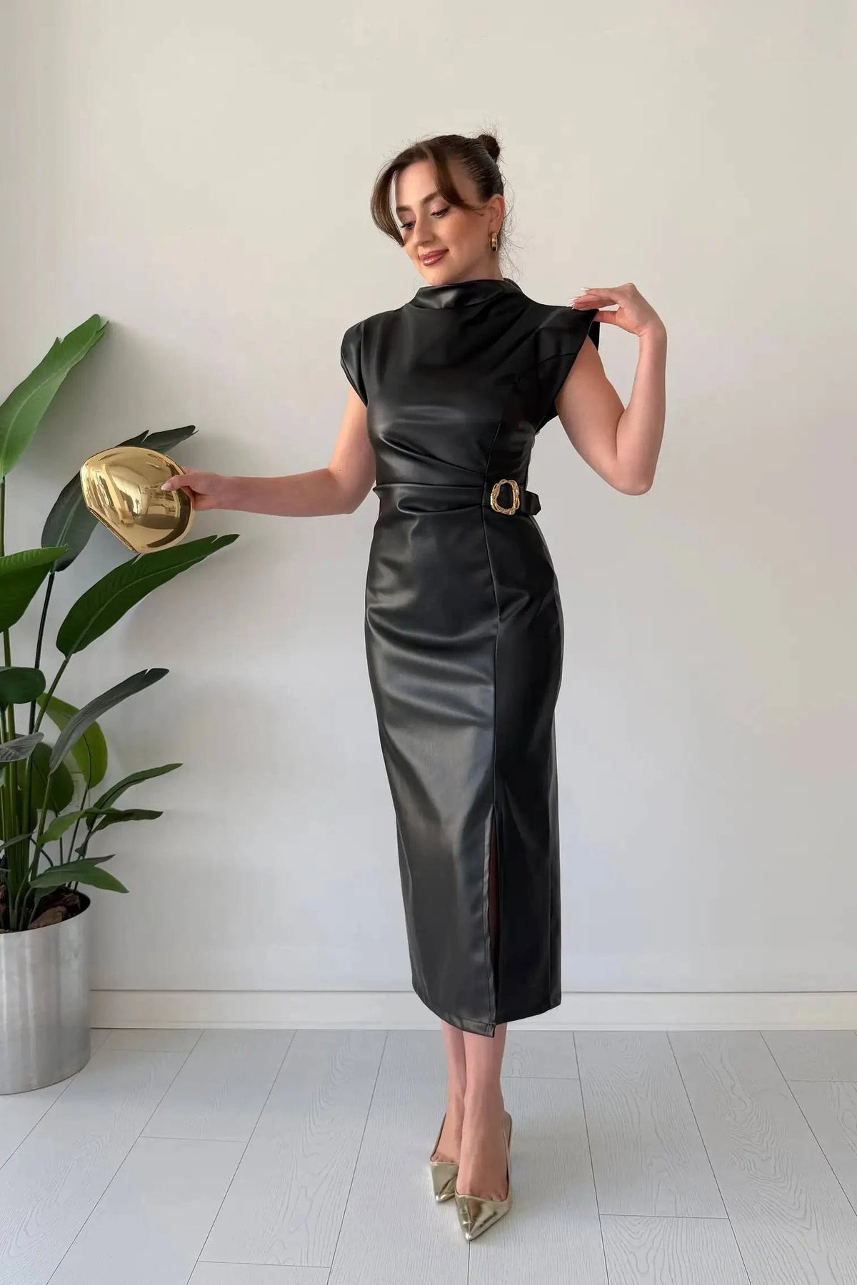 Elegant flowing Numira™ dress by Emma & Rose Manhattan, featuring lightweight fabric and a graceful silhouette.
