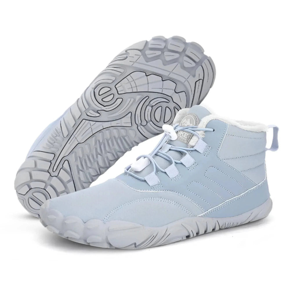 Light blue Vanessa™ Caspar Pro non-slip shoes from Emma & Rose Cape Town, featuring a sleek design and textured sole.